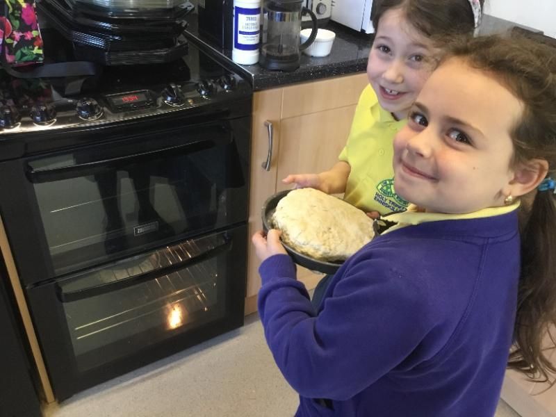 Bread making in P3: Putting the bread in the oven