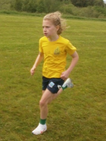 Meabh competing in the P6 Girls Cross Country competition.