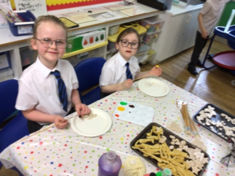 Decorating our salt dough party food.