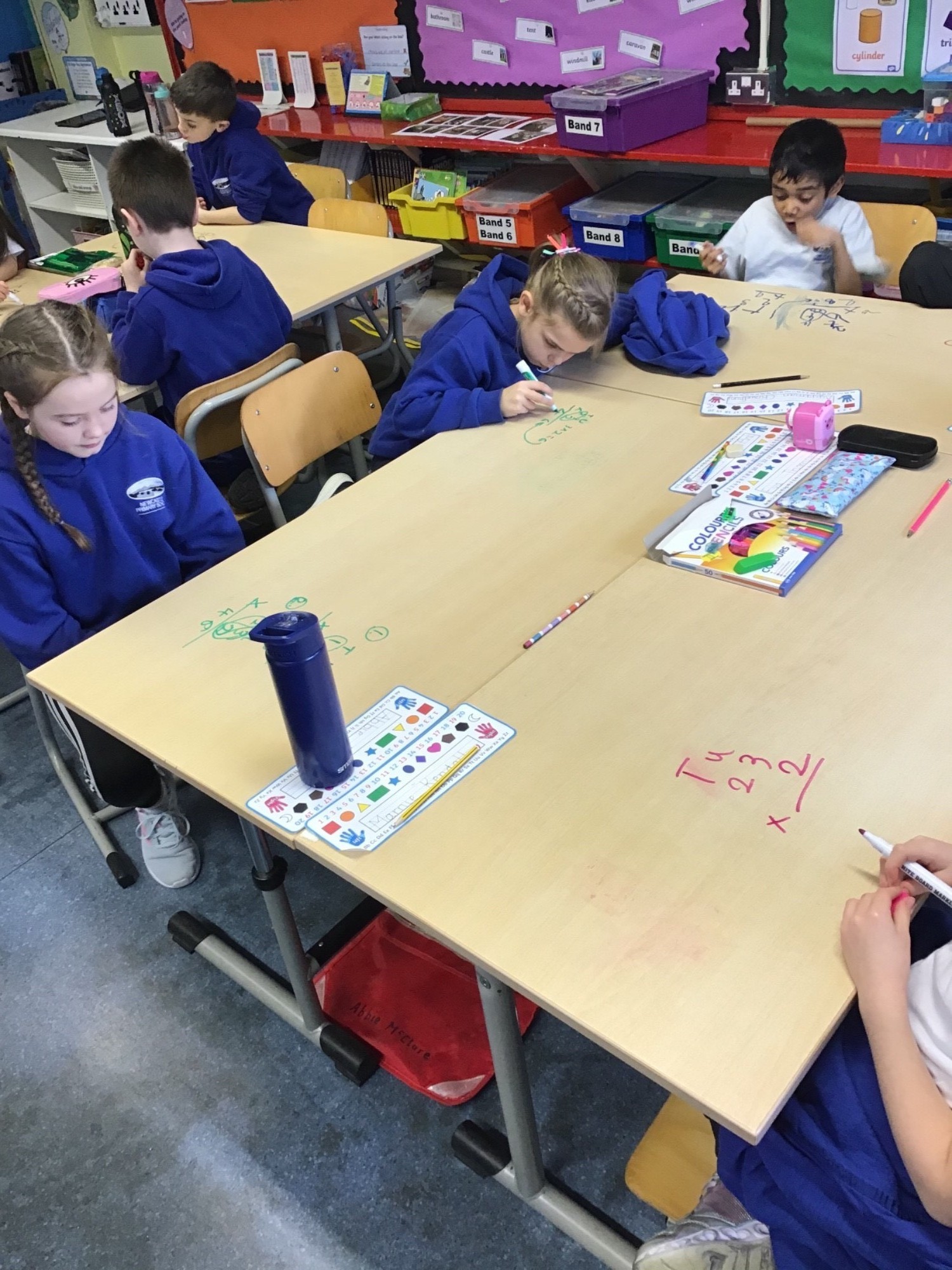 P4 love it when they can do their Maths on tables!