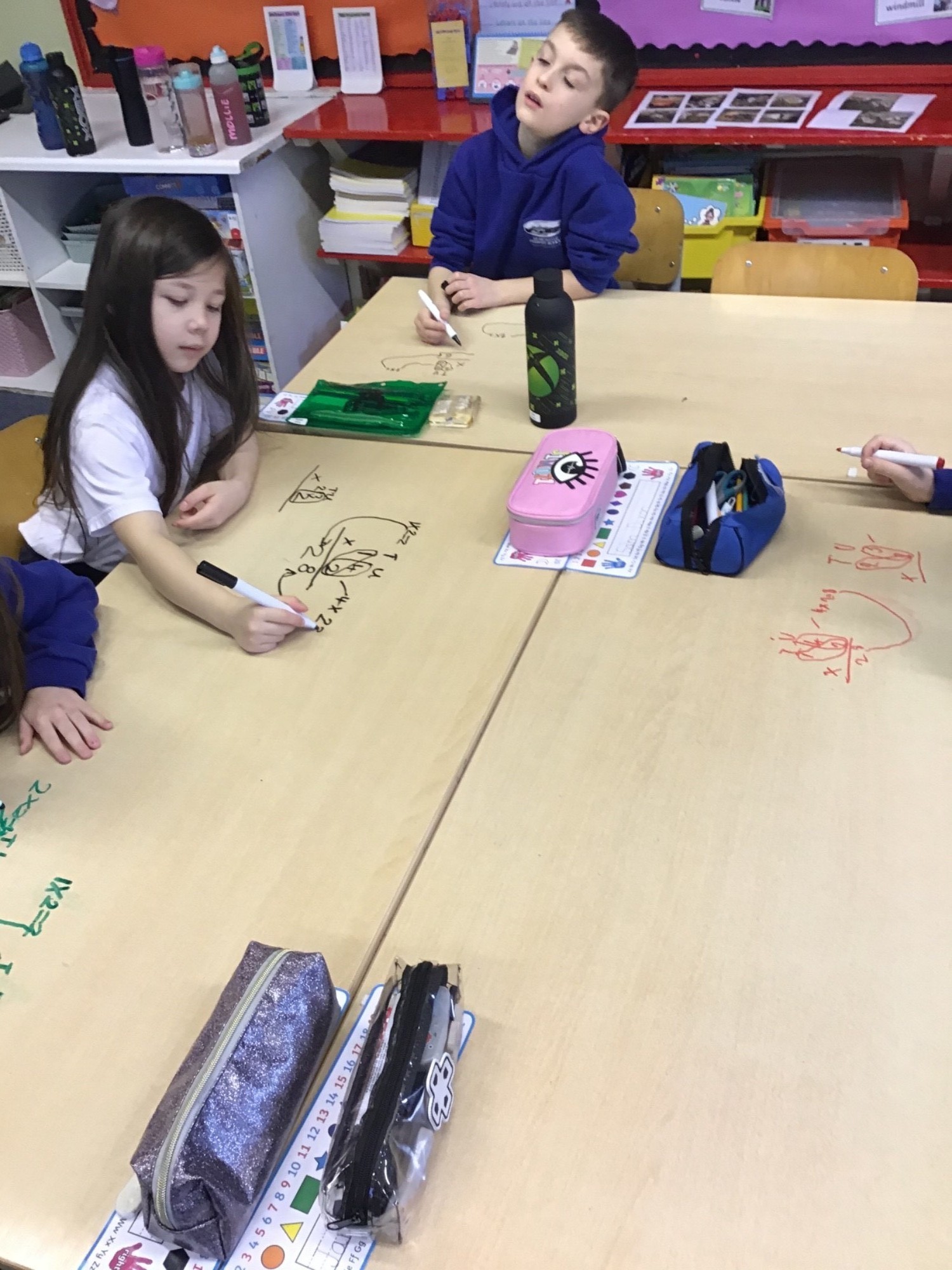 P4 love it when they can do their Maths on tables!