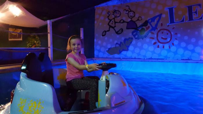 Kerry having fun on the bumper boats!