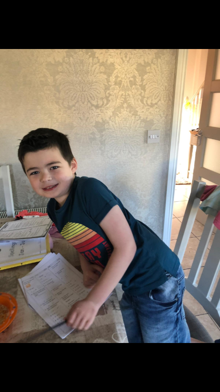 ConĂ¡ll working hard at his Literacy and Numeracy