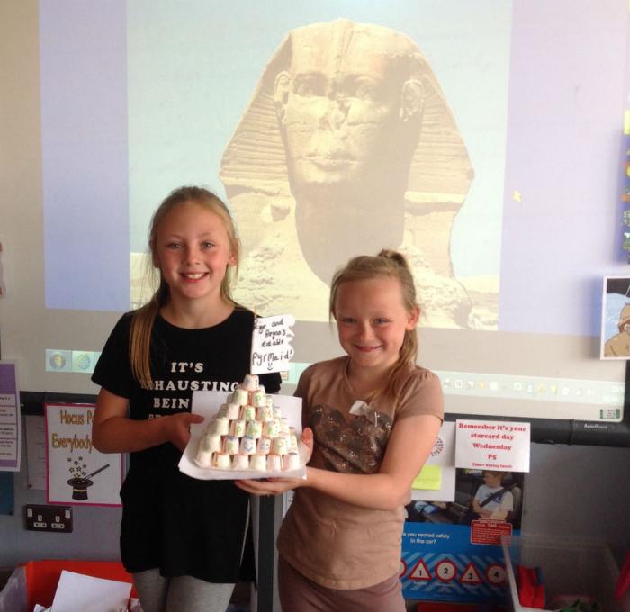 Paige and Regan decided to build their pyramid out of large marshmallows and used icing to write on the outside of it!