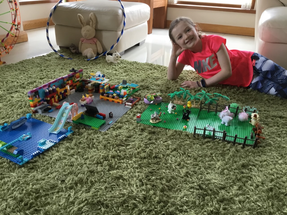 A lego mansion with beautiful gardens and mod cons.