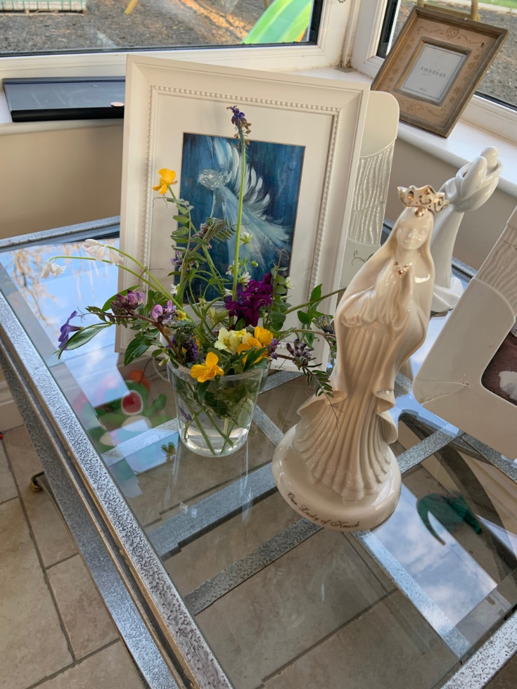 A beautiful May altar. I love your fresh flowers. Our Lady of Knock pray for us.