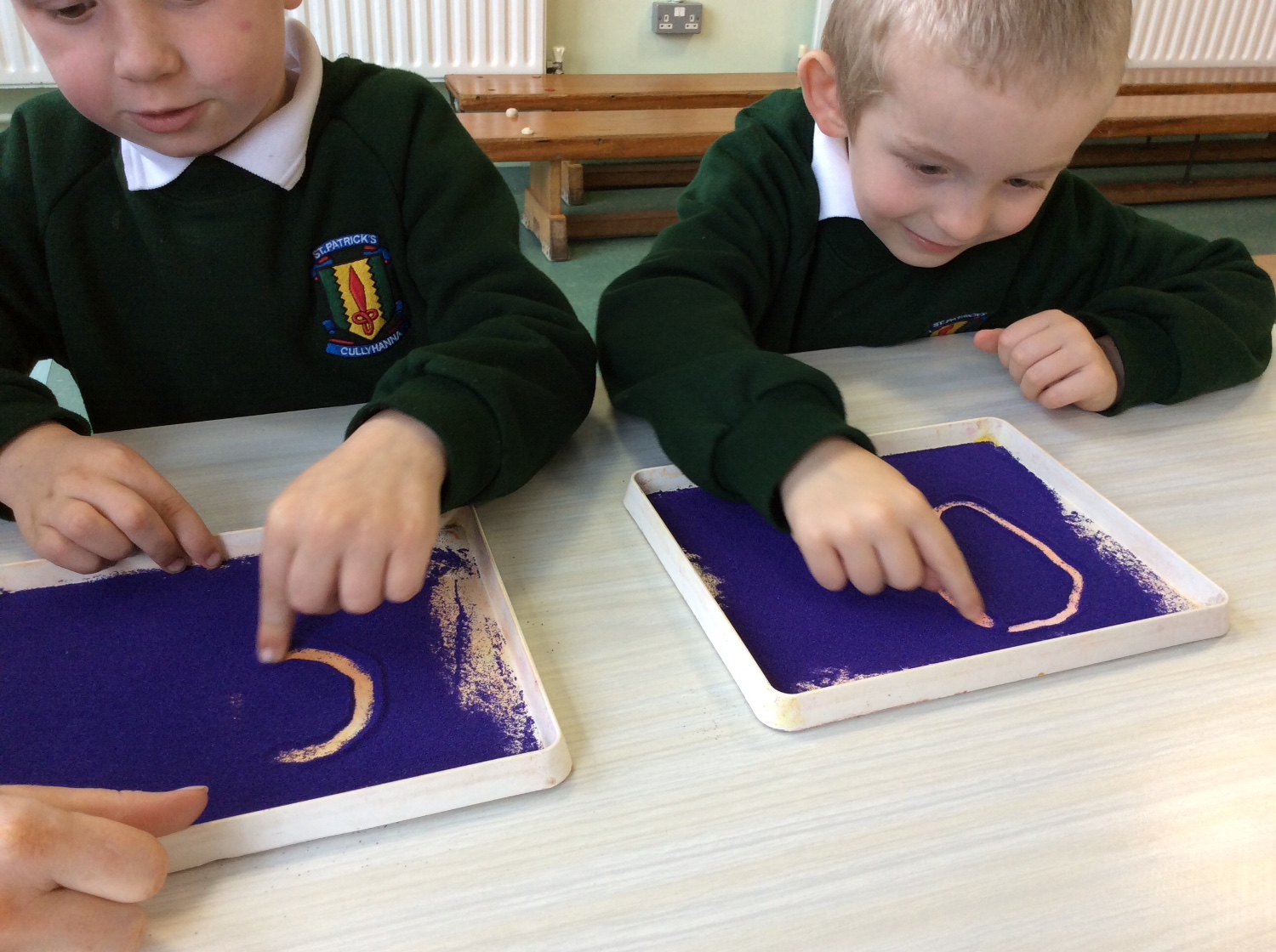 We can trace letters in sand.