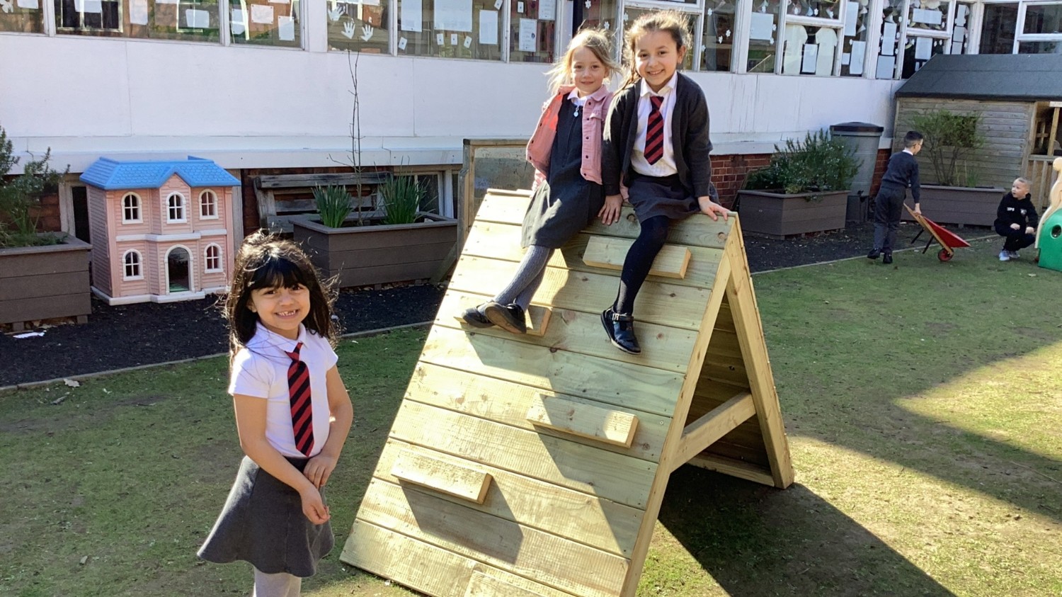 Lots of fun climbing on the new piece of garden play equipment.