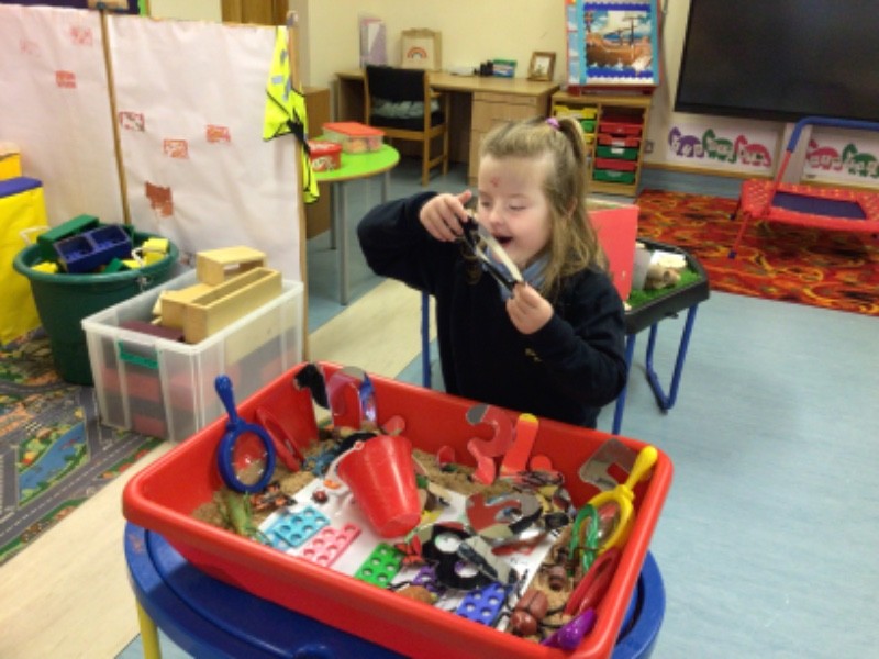 Developing numeracy and encouraging excitement about the World Around Us through sand play provision.