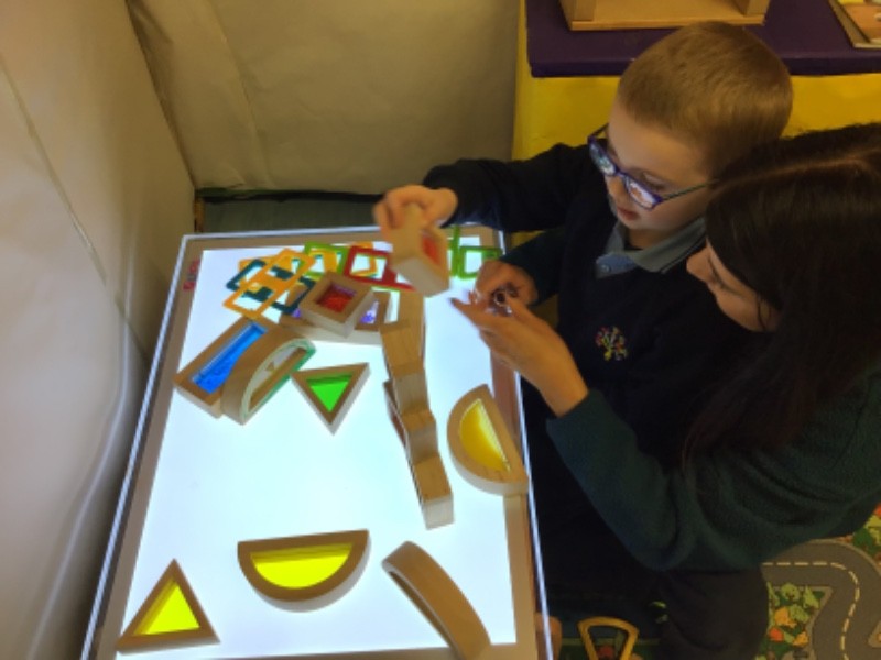 The light tray has encouraged me to build with the sensory blocks.