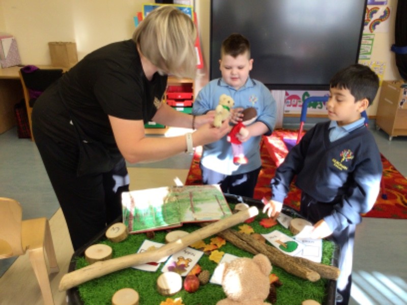We are enjoying a sensory story, and being encouraged to develop our literacy skills in this small world provision.