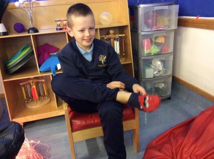 Developing self help skills to get ready for foot massage
