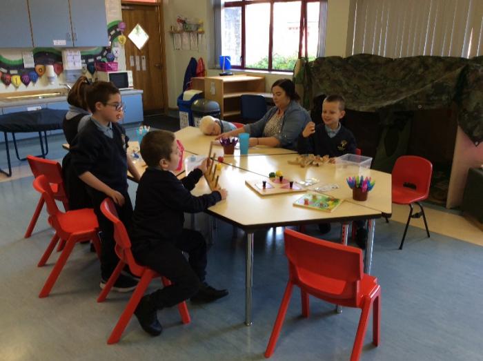 We're all sharing space to complete table top activities.
