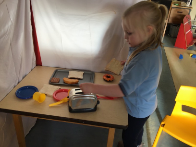The waitress preparing lunch.
