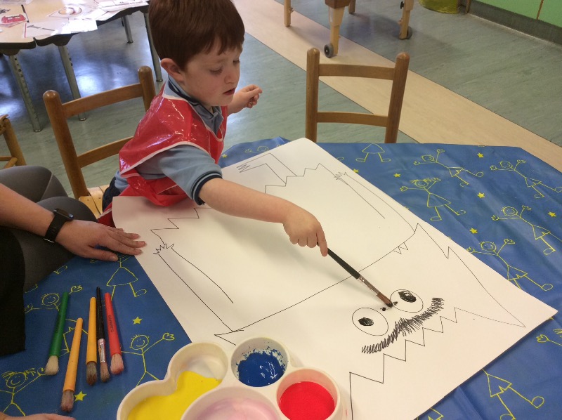 Painting our mixed up colour monster.