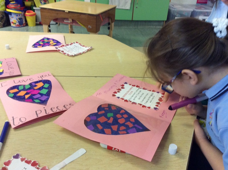 Writing my valentine's card to mummy and daddy.