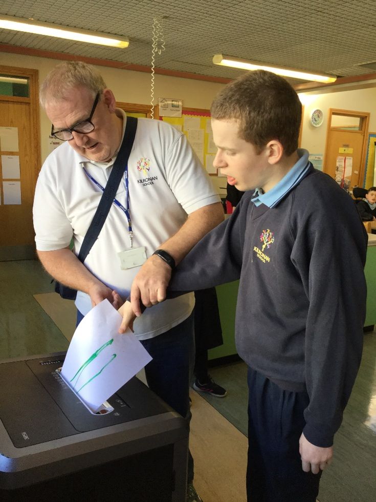Assisting the office staff by using the shredder.