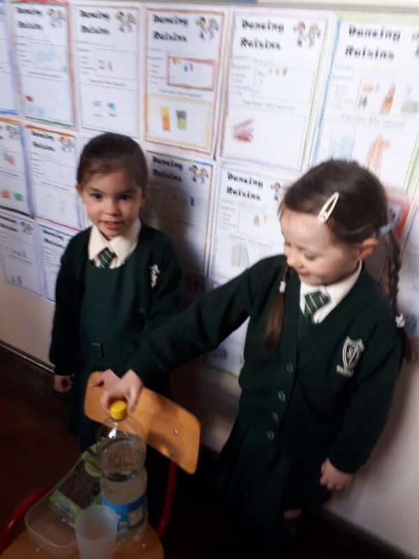 Our two scientists show off our experiment equipment