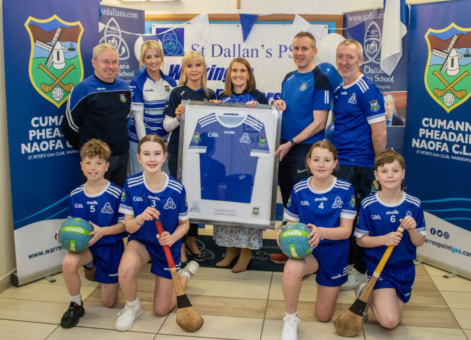 (BACK ROW: L-R) Paul McKibben (Warrenpoint GAA Chairman), Noreen Kelly (Teacher/Football Committee PRO), Kirsti McDonald (VP), Una Farrell (Principal), Steve Robinson (Football Committee Chairman), Brendan Rice (GAA Co-ordinator) (FRONT ROW: L-R) Conall Griffin, Cerrian Sloan, Amy O'Hare, Paddy Mallon