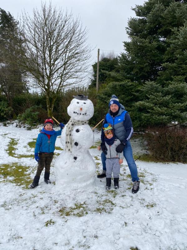 A very tall snowman in Shay's garden!