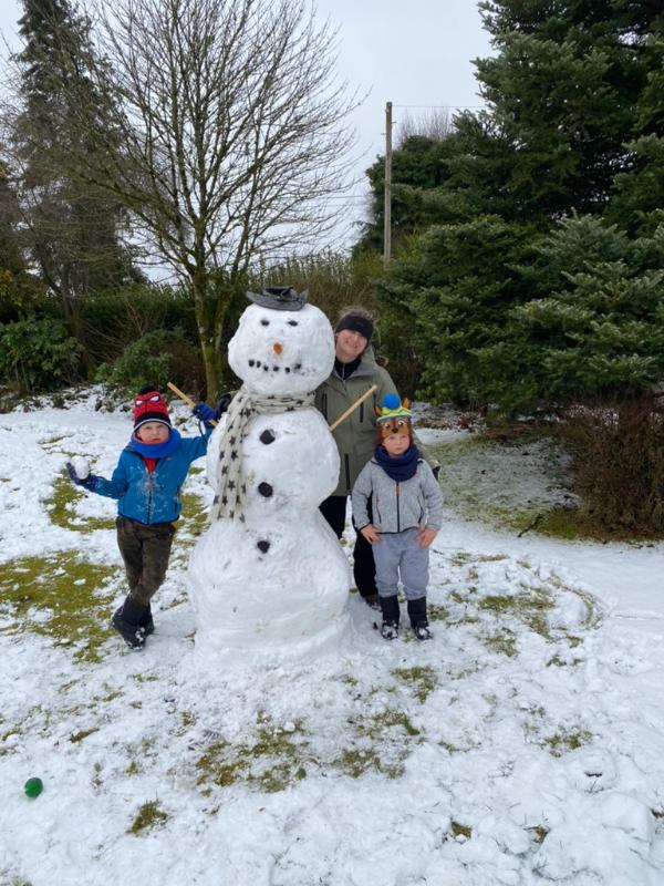 A very tall snowman in Shay's garden!