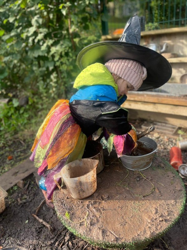Making potions in our mud kitchen
