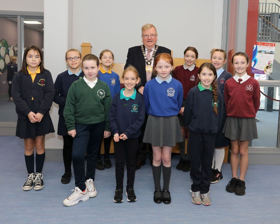 FODC vice chairperson, Allan Rainey, with pupils representing schools which attended the Ceili Mor on 22-11-22