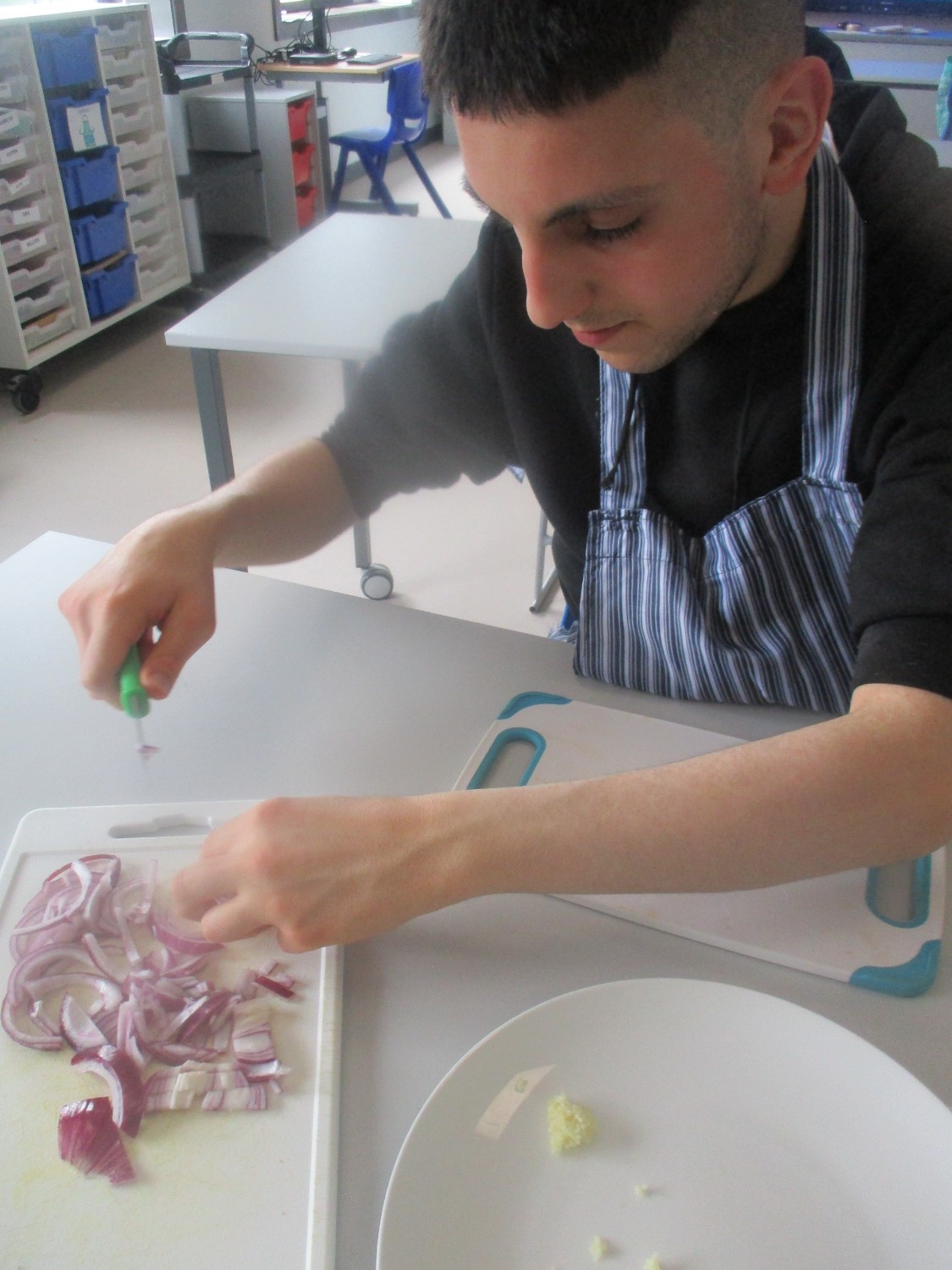 Toni is showing his Italian heritage with the garlic and onion preparations!