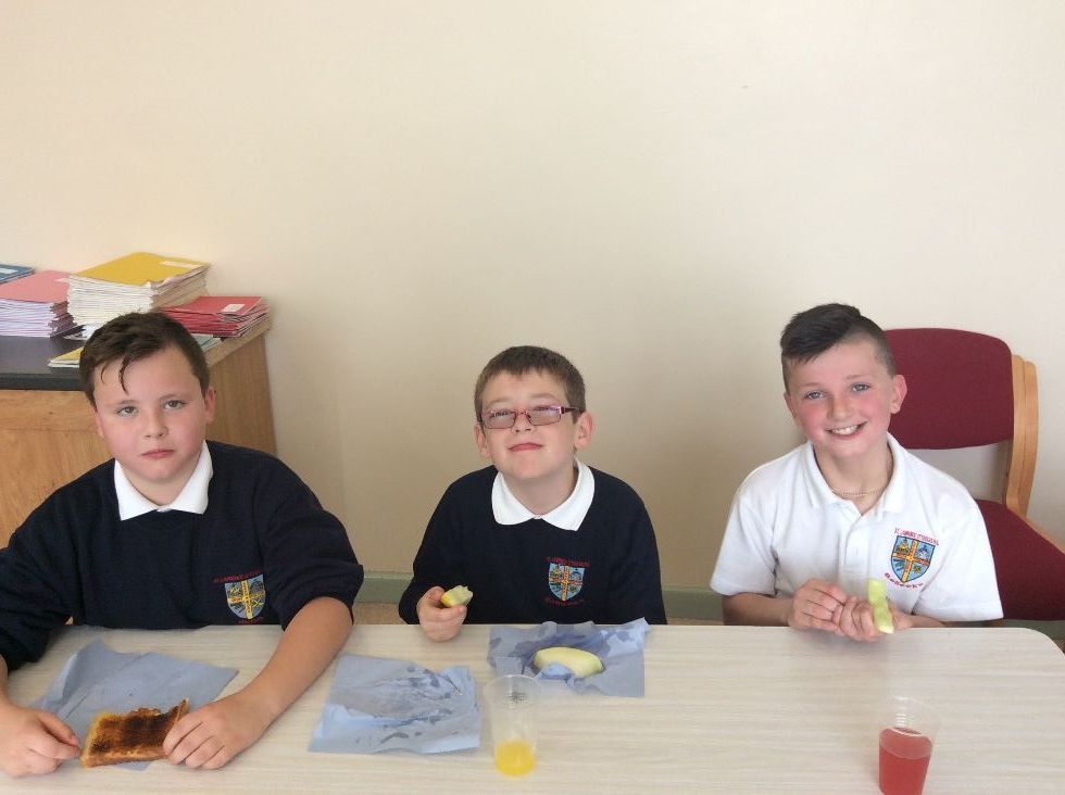 Good friends enjoying their toast and fruit