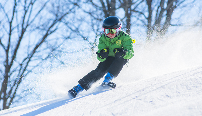 little boy skiing