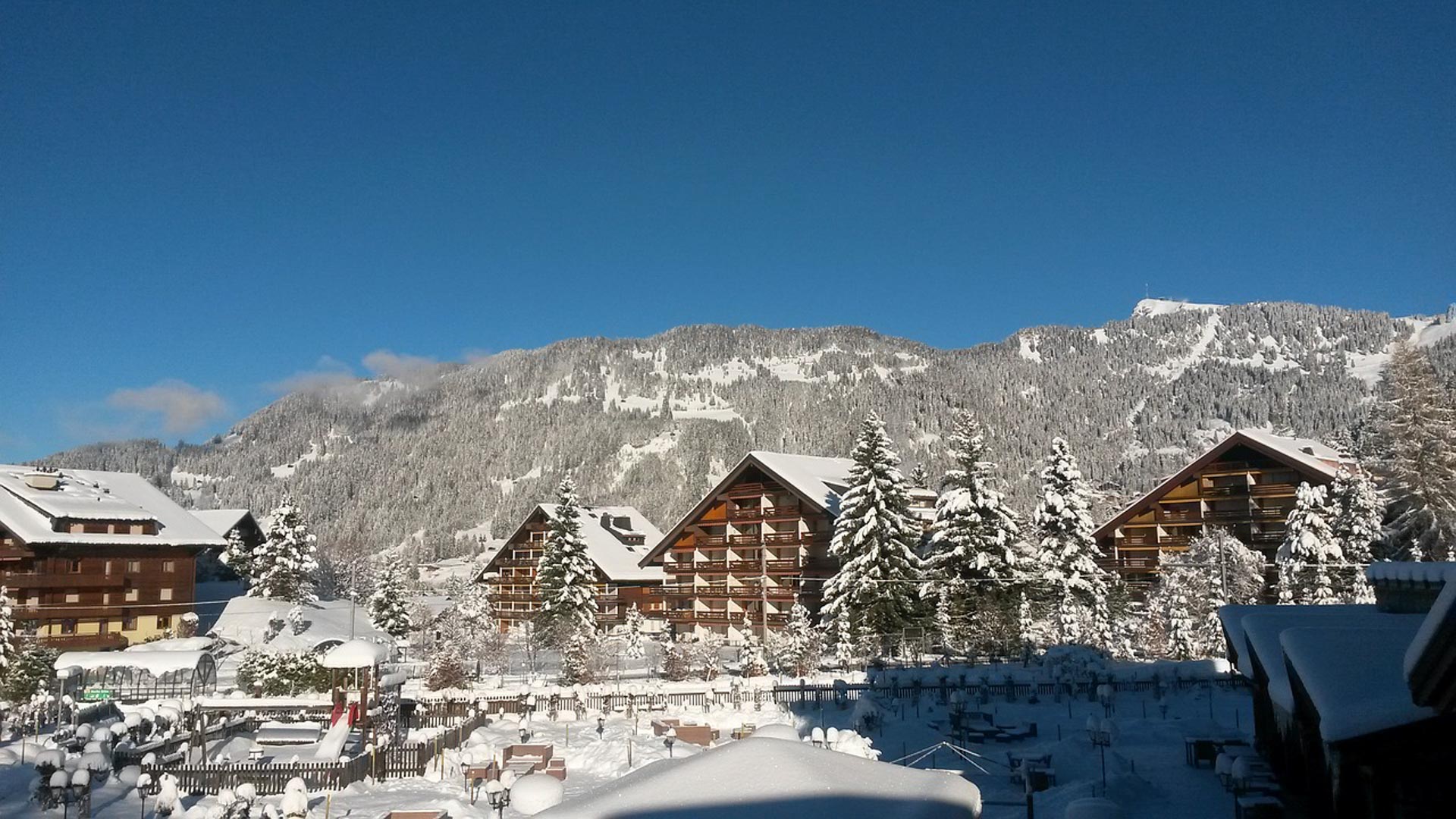 The village of Villars covered in a fresh snowfall before the start of a great day of ski lessons