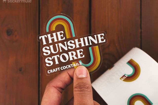 hand holding a custom clear label