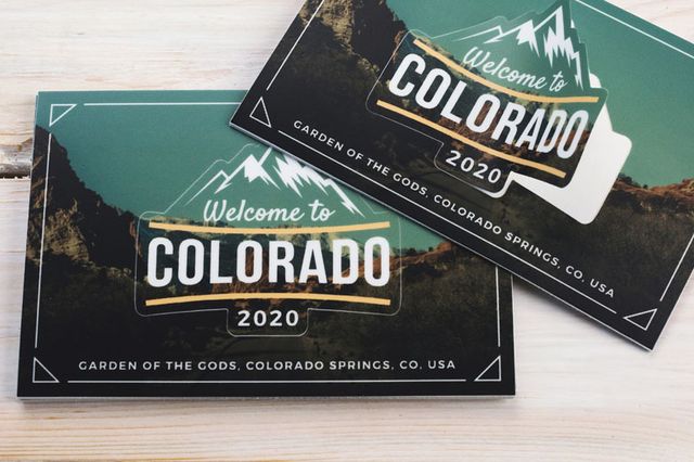 Custom kiss cut stickers that look like postcards from Colorado