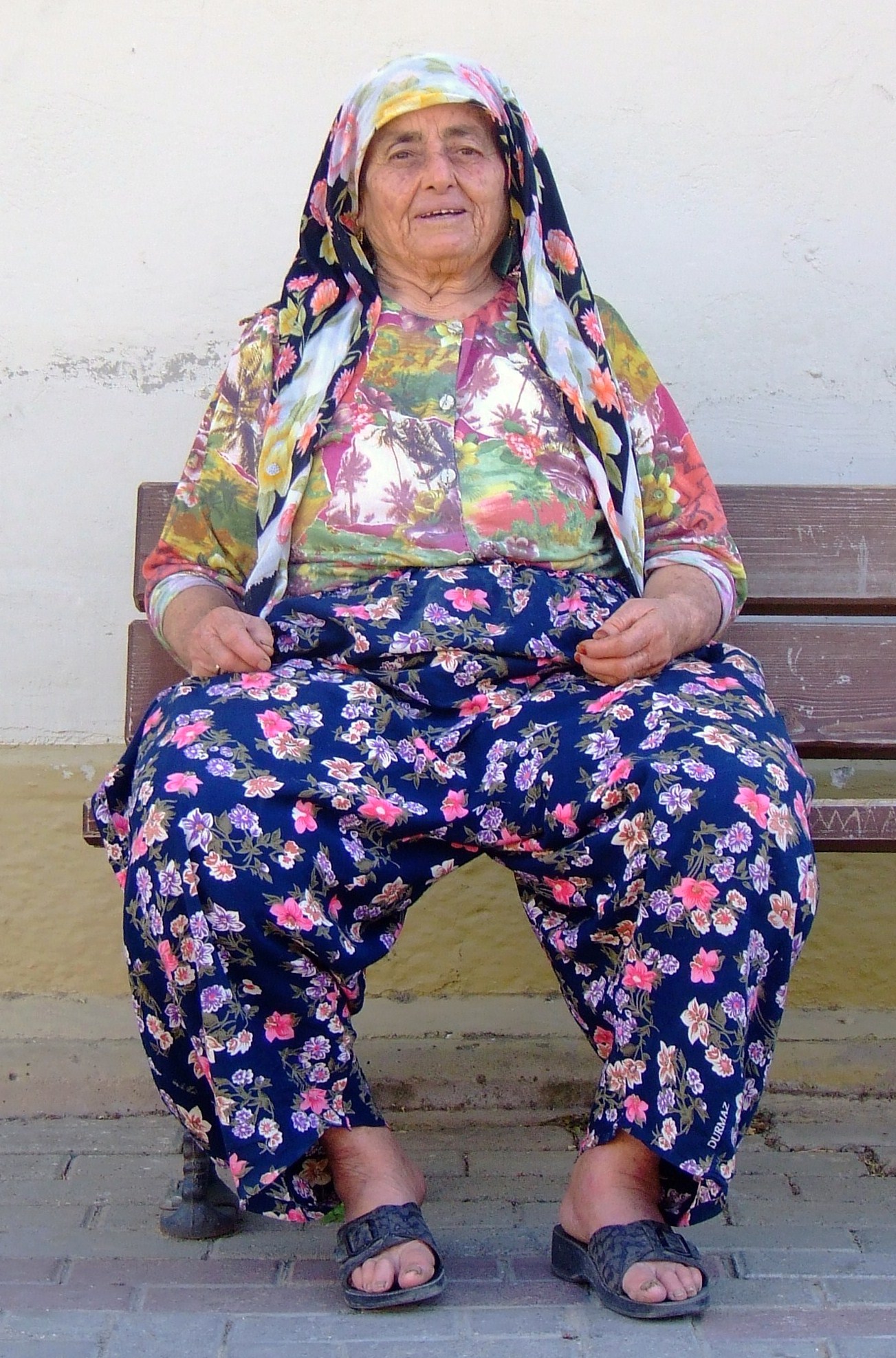 A woman in Selçuk, Turkey wearing traditional Turkish trousers similar to a salwar.