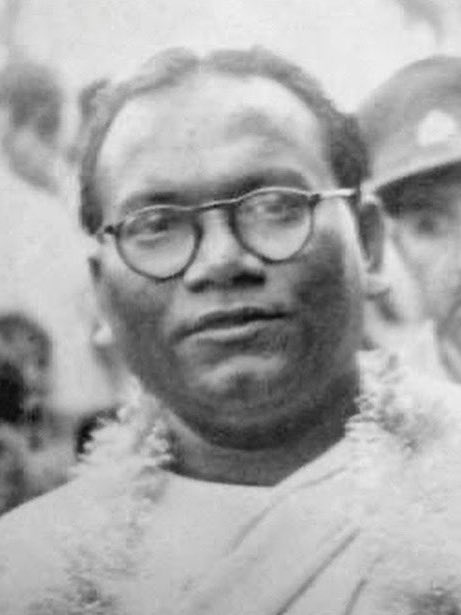 black-and-white, close-up image of Jogendra Nath Mandal looking directly at camera