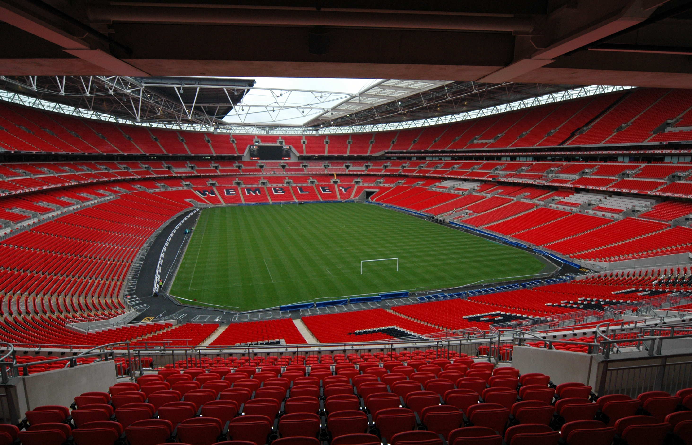 Wembley Stadium, home of the England football team, has a seating capacity of 90,000. It is the UK's biggest stadium.[268]