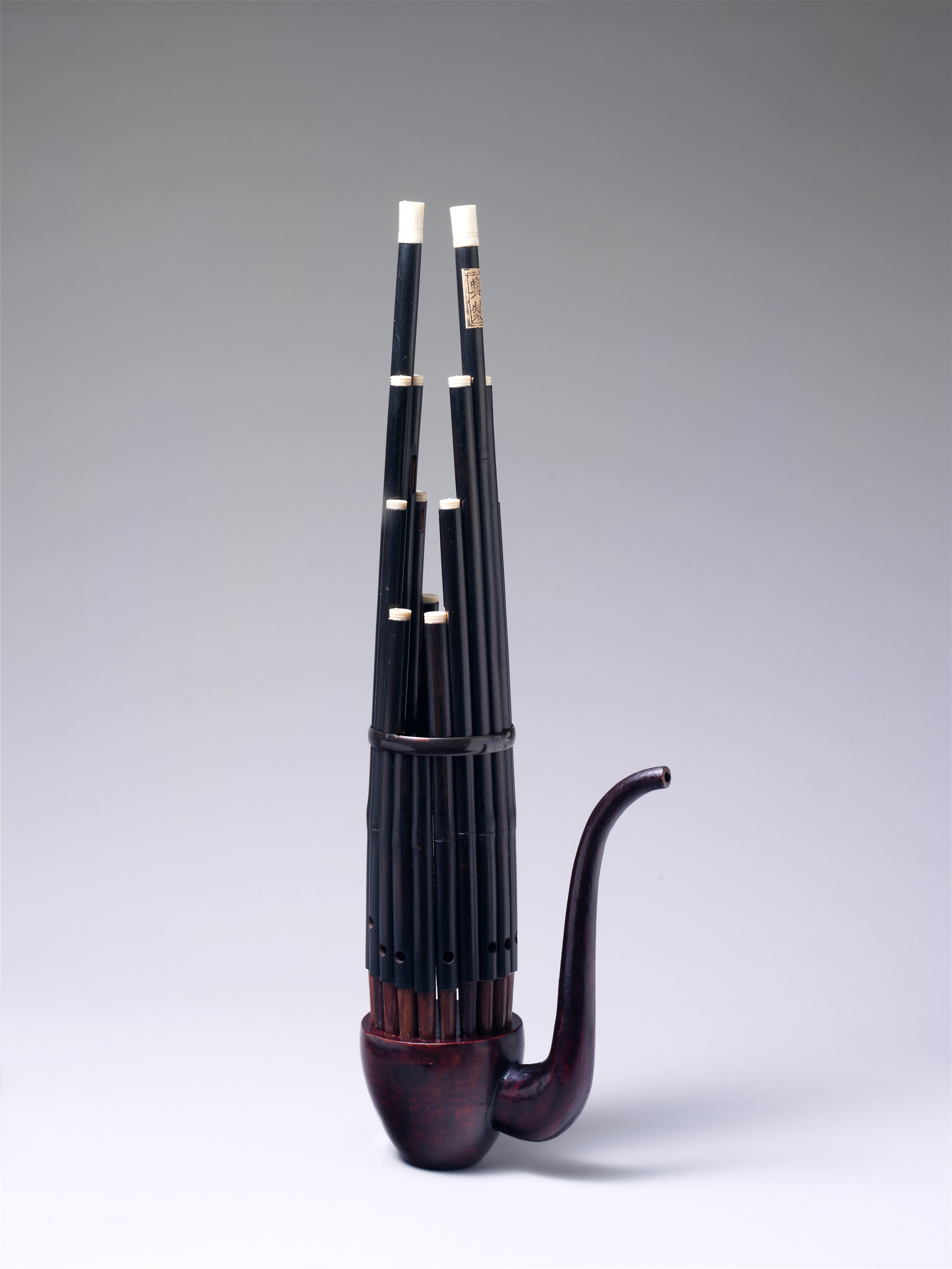 Chinese sheng mouth organ, using oriental free reeds.