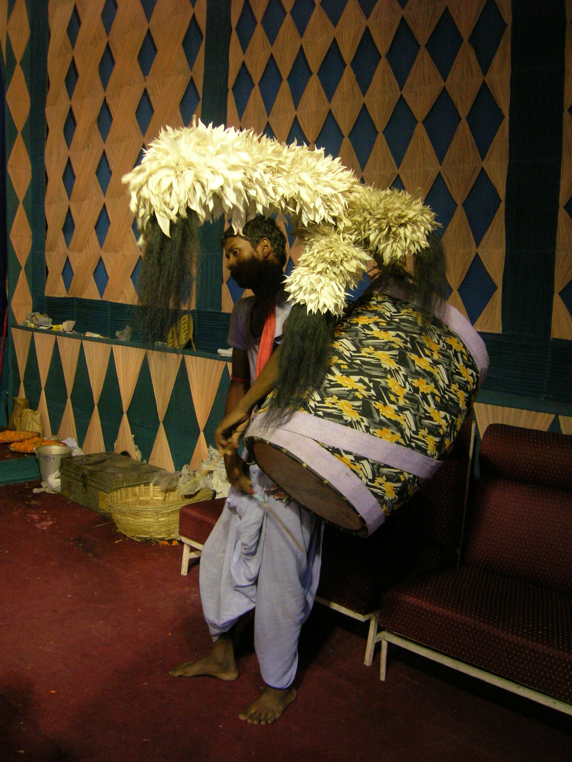 A dhaki with his magnificent dhak at a South Kolkata Durga Puja pandal, 2010.