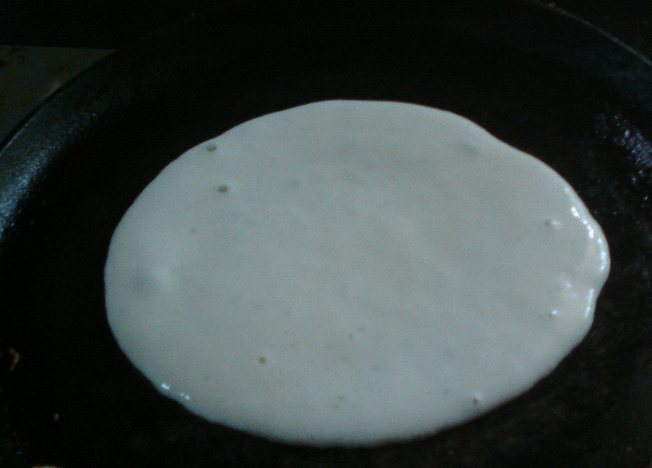 Batter poured on a tava or griddle
