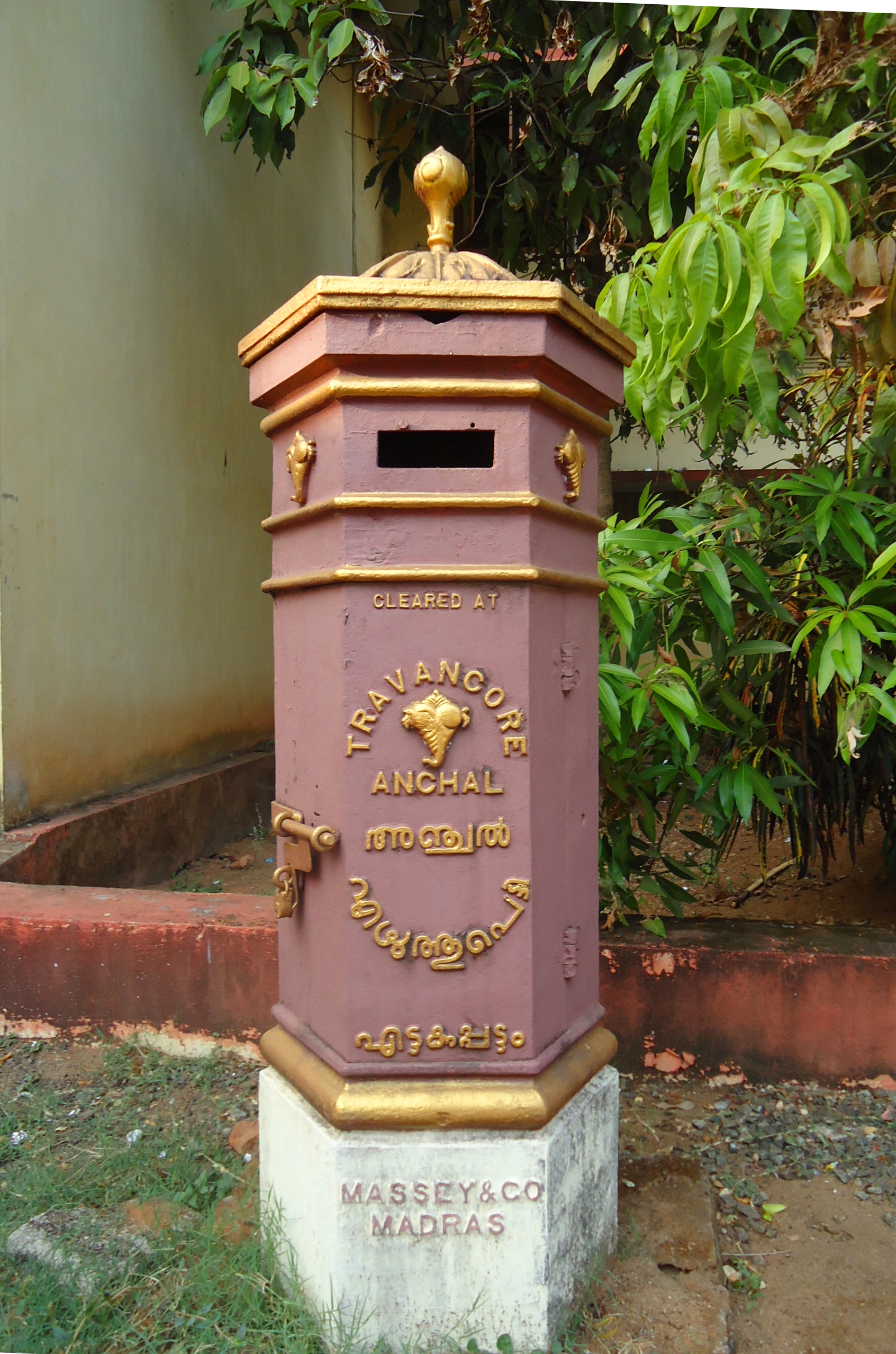 Travancore's postal service adopted a standard cast iron pillar box, made by Massey & Co in Madras, and similar to the British Penfold model that was introduced in 1866. This Anchal post box is in Perumbavoor.