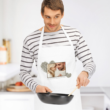 Man wearing personalised apron with message for girlfriend