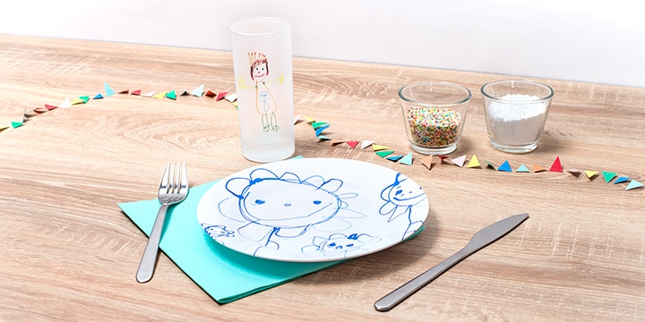 Frosted glass and kids plate with kids drawing on them