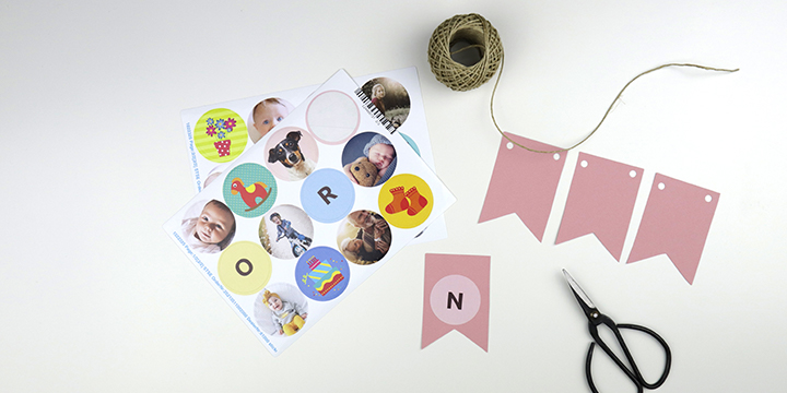 Create some mini bunting with the baby's name