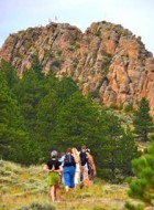 hikers approach mountain ridge