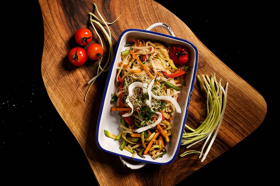 Vegetables stew with spicy rice noodles ans sesame seeds photo