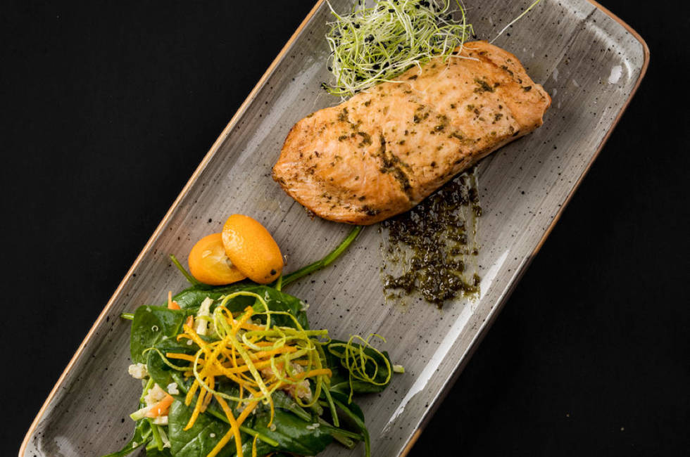 Citrus salmon, grilled on a hot plate photo