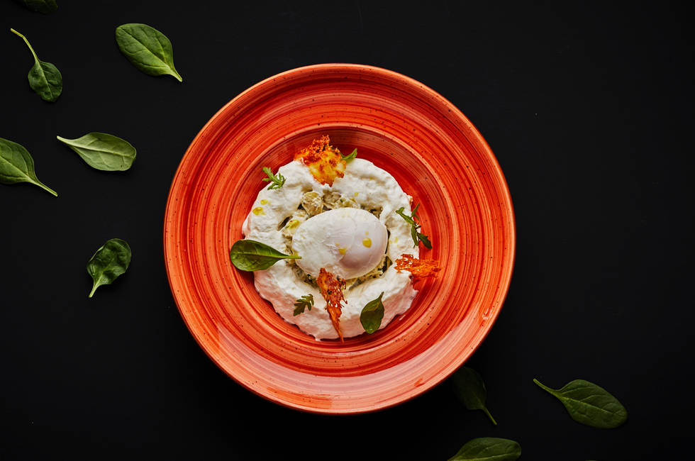 Poached egg with parmesan foam photo