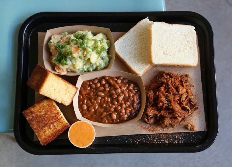 a barbecue plate at mothership inside earthbound beer