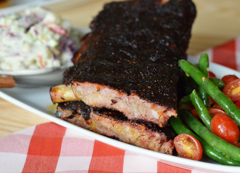 smoked ribs with sweet pepper potato salad and green beans with tomato