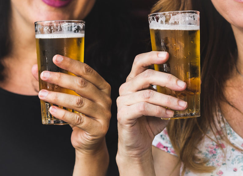 two women with beer